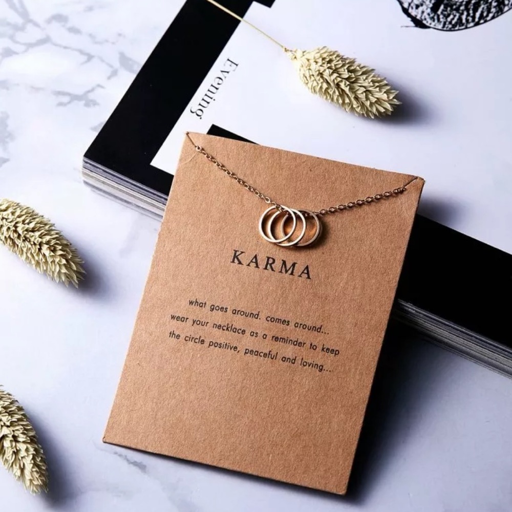 Gold Karma clavicle necklace on dainty chain